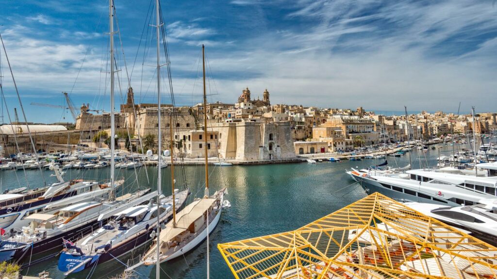 Discover Birgu's Coastal Beauty: Old City Charm and Majestic Yachts Along the Waterfront