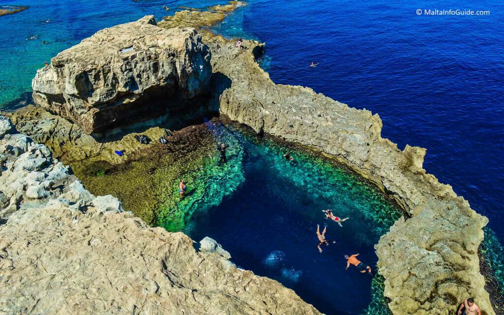 Dwejra, Gozo, Malta: A captivating view of the dramatic limestone cliffs and azure waters of the Mediterranean Sea. The iconic rock formations, including the famous Azure Window (formerly), create a stunning natural landscape that attracts visitors from around the world to marvel at its beauty and tranquility.