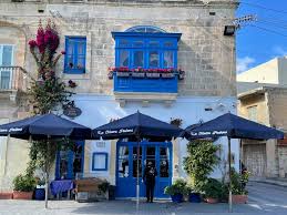 Ristorante La Nostra Padrona in Marsaskala, Malta, offers a charming seaside setting and serves delicious seafood dishes, providing a perfect backdrop for enjoying fresh catches during fishermen's feasts and seafood festivals.