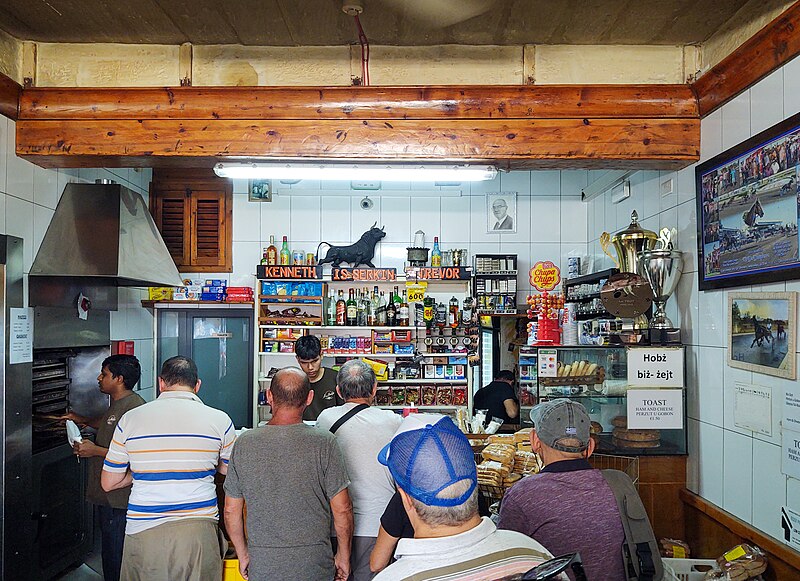 Exterior of Is-Serkin, the iconic pastizzeria in Malta, known for its traditional pastizzi and bustling atmosphere.