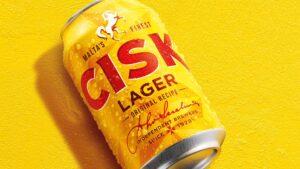 Chilled Cisk Lager in a glass, showcasing Malta's iconic beer with its golden hue and refreshing taste, brewed by Simonds Farsons Cisk.