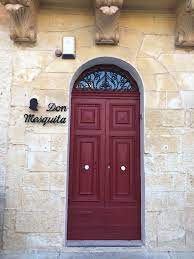 A cozy scene from Don Mesquita restaurant in Mdina, Malta, featuring elegant interior décor and delicious Maltese cuisine.