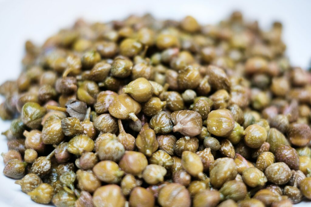 Capers: Tangy and Versatile Mediterranean Delicacy, Perfect for Adding Zing to Dishes