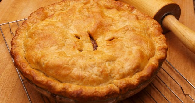 Whole Maltese Lampuki Pie: Golden Pastry Filled with Fresh Fish and Vegetables