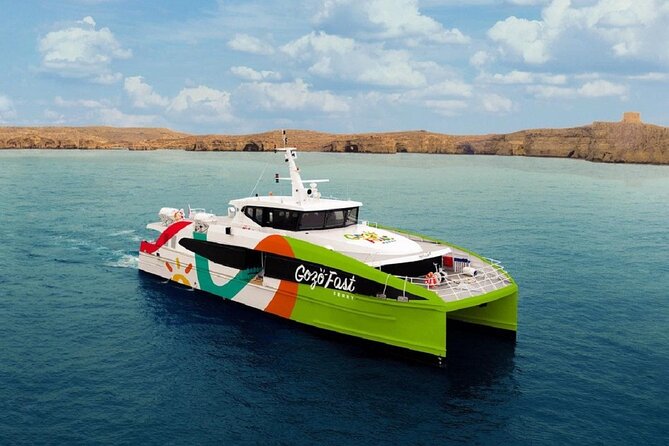 Ferry departing from Gozo to Malta, crossing the turquoise waters of the Mediterranean Sea with a scenic view of the islands.