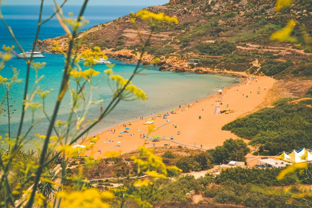 Stunning view of Ramla Bay with its distinctive red sand and crystal-clear turquoise waters in Gozo.